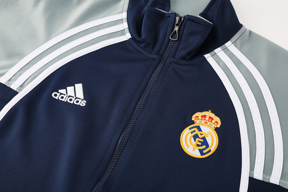 Ensemble de survêtement veste-pantalon Real Madrid Pre-Match bleu marine et gris