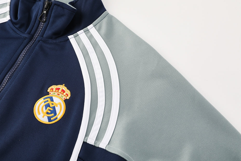Ensemble de survêtement veste-pantalon Real Madrid Pre-Match bleu marine et gris