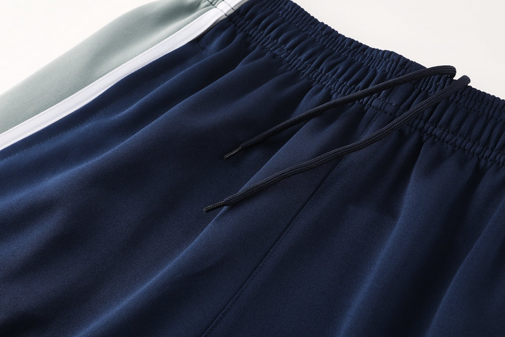 Ensemble de survêtement veste-pantalon Real Madrid Pre-Match bleu marine et gris